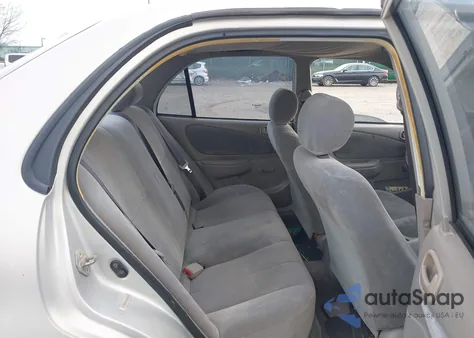 2001 Toyota Corolla Ce из США, поврежденный, VIN 2T1BR12E71C476234